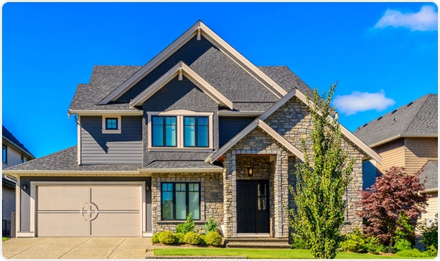 A Denver home with a new asphalt shingle roof installed by Red Diamond Roofing