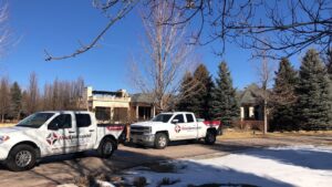 Red Diamond Trucks at Roofing Project