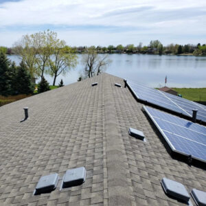 Roof with Solar Panels overlooking a lake
