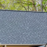 Close-up of a charcoal asphalt shingle roof on a residential home in Colorado